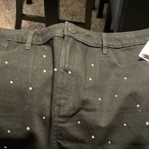 Black Diamond denim skirt with split in the back.